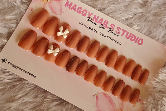 brown bow nails